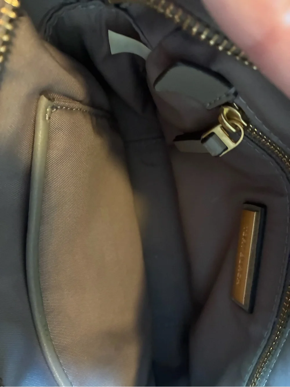 Tory Burch features compact stylish